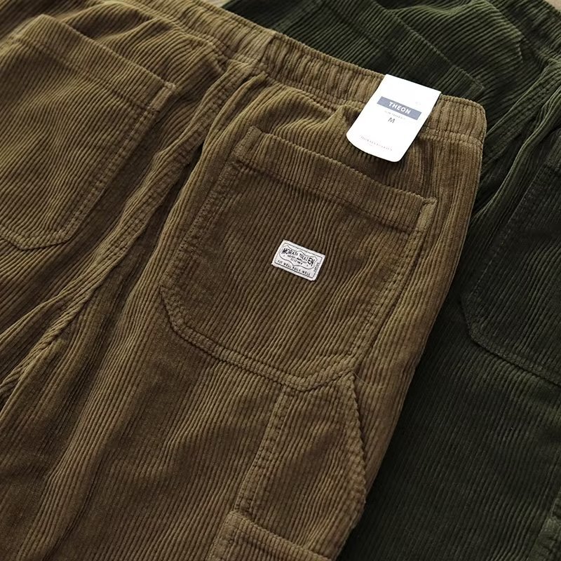 Otoño e invierno europeo y americano Nueva moda micro cintura elástica con cordón ropa de trabajo pantalones atados al tobillo pantalones casuales de pana retro para hombres