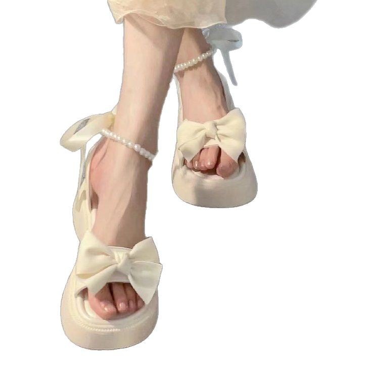 Sandalias de vacaciones coreanas de princesa para mujeres verano 2026 nuevo arco de fondo grueso estilo de hadas con falda zapatos romanos image 6