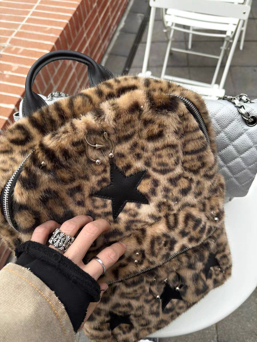 ROLLING MONEY25FW Remach Zipper ajustable de cuero bicolor de hombro perforado punk bolsa de calle