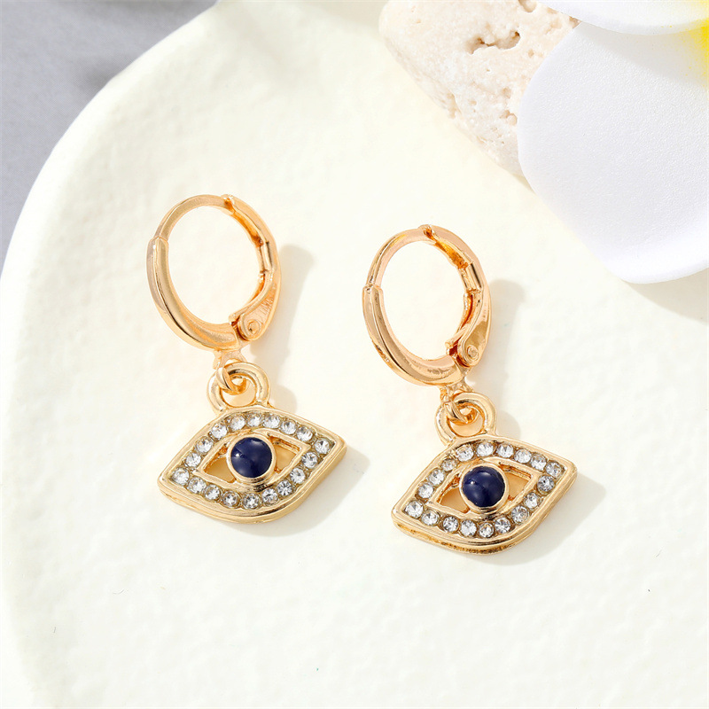 Retro Round Multi-color Devil's Eye Shape Inlaid Zircon Metal Drop Earrings Wholesale display picture 5