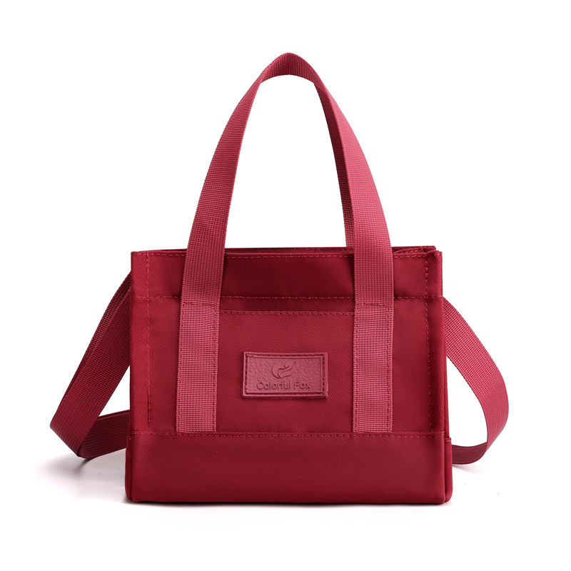 Bolsos de mujer de nylon impermeables transfronterizos, bolsos de moda y sencillos, bolsos de personalidad, compras ligeras, bolsos de hombro único portátiles