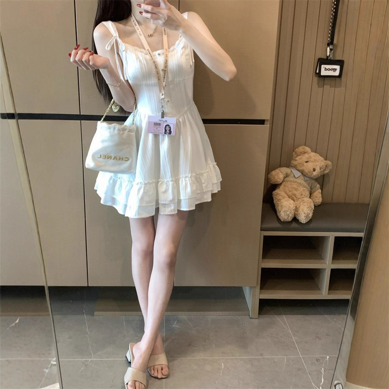 女装夏季2025白色吊带连衣裙度假风时尚设计蕾丝拼接收腰a字短裙|undefined