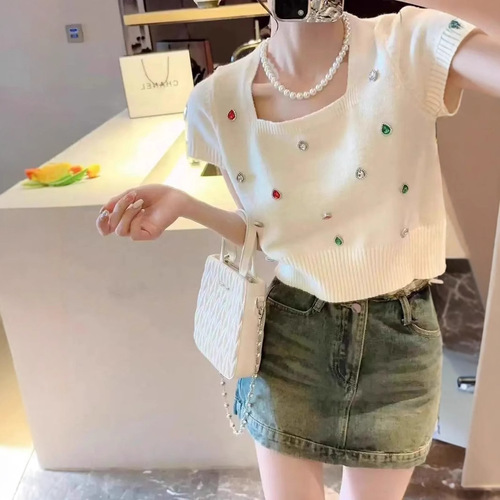 Sleek, sultry, and sweet—this chic, uniquely designed knit short-sleeve T-shirt features a bold square neckline, perfect for summer vibes and effortlessly eye-catching style.