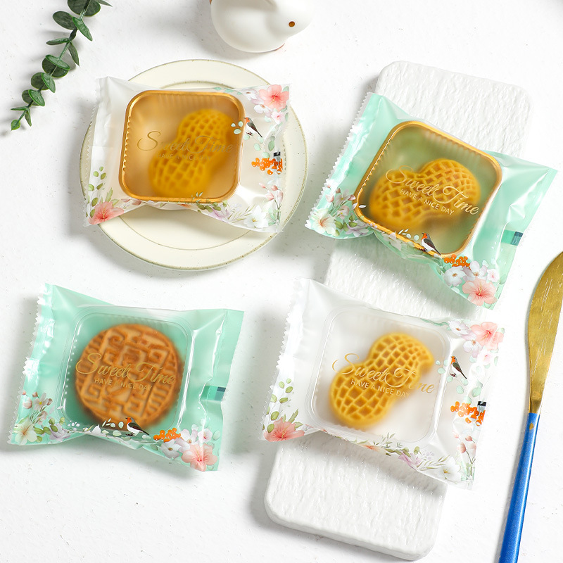 Nueva bolsa de embalaje de pastel de Luna 50g100G bolsa de pastel de Luna máquina bolsa de sello Festival del Medio Otoño flujo corazón yema de huevo crujiente pastel de Luna embalaje al por mayor