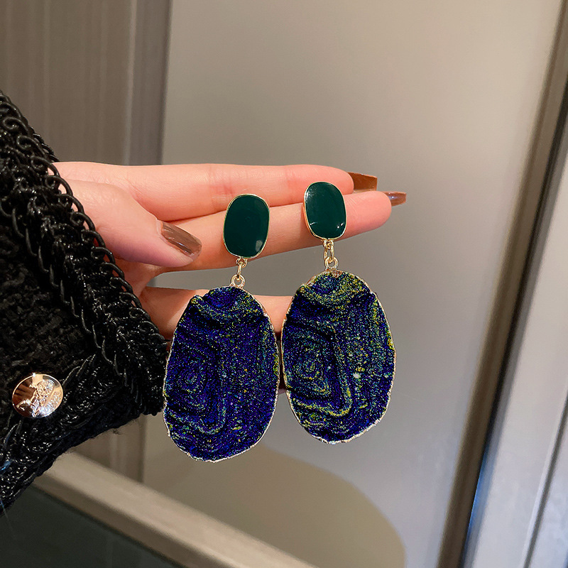 Pendientes geométricos plisados azules de aguja de plata pendientes encantadores irregulares femeninos Pendientes retro de personalidad exagerada de Europa y América