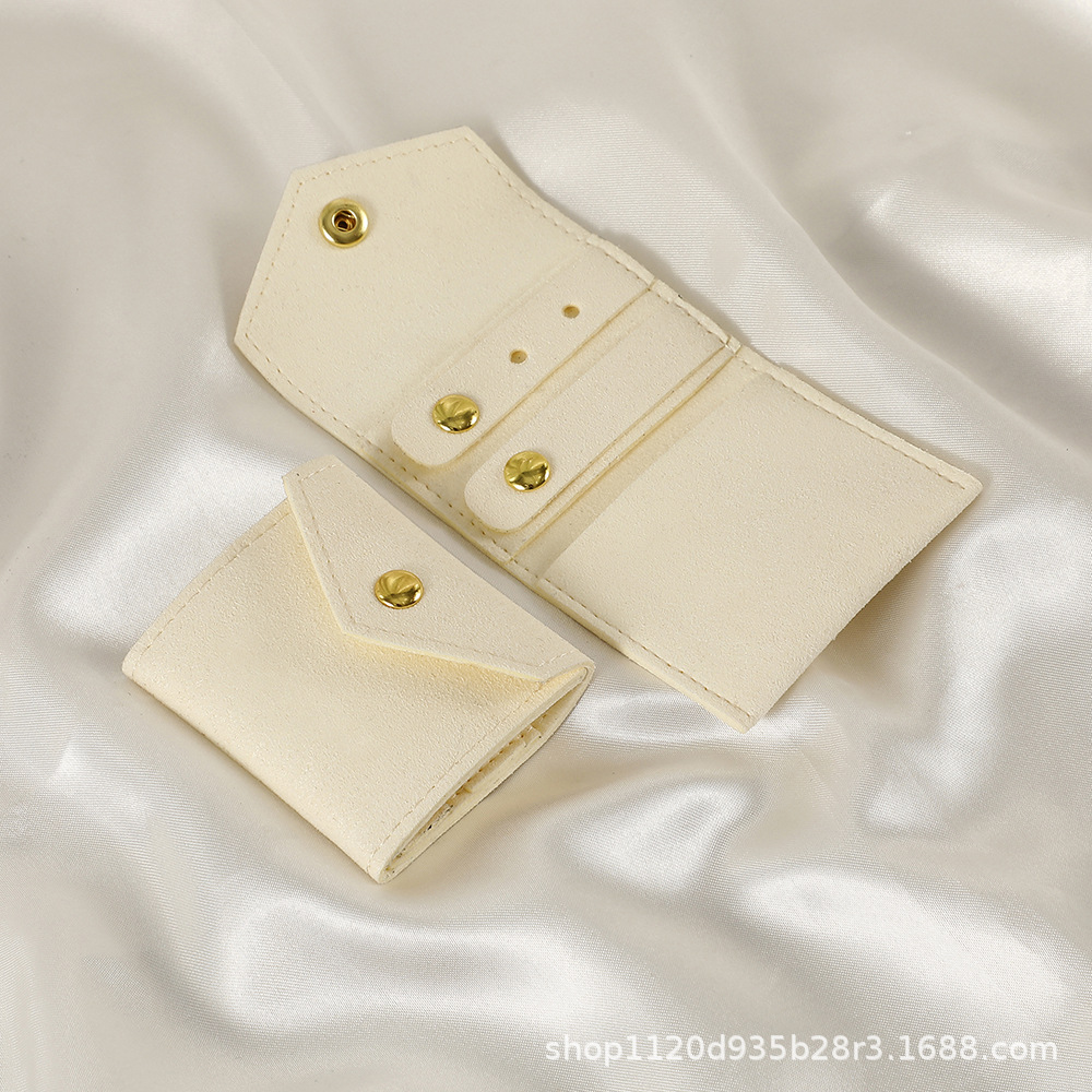 Spot microfibra portátil multifuncional mini joyería rollo de joyería pendiente anillo pendiente collar bolsa de protección de almacenamiento