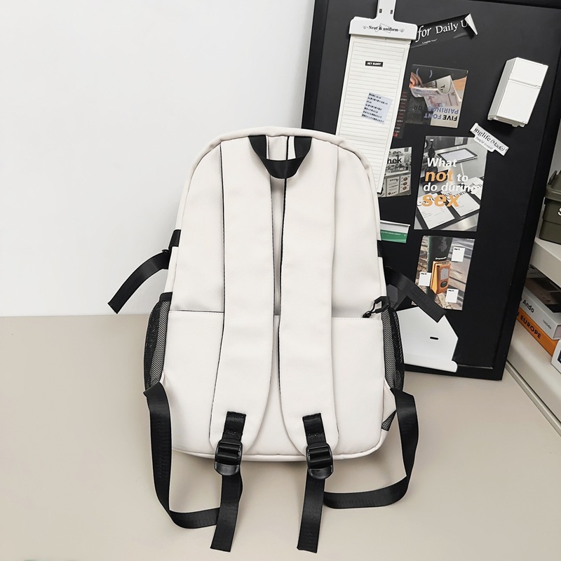 Mochila escolar resistente al desgaste para estudiantes universitarios en clase, mochila simple y versátil para estudiantes de secundaria, mochila de viaje de gran capacidad al por mayor