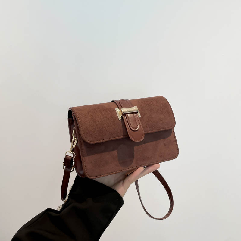 Bolso bandolera de un solo hombro con textura de alta calidad de gamuza de moda coreana 2025 primavera nuevo bolso cuadrado pequeño para el trabajo y los viajeros