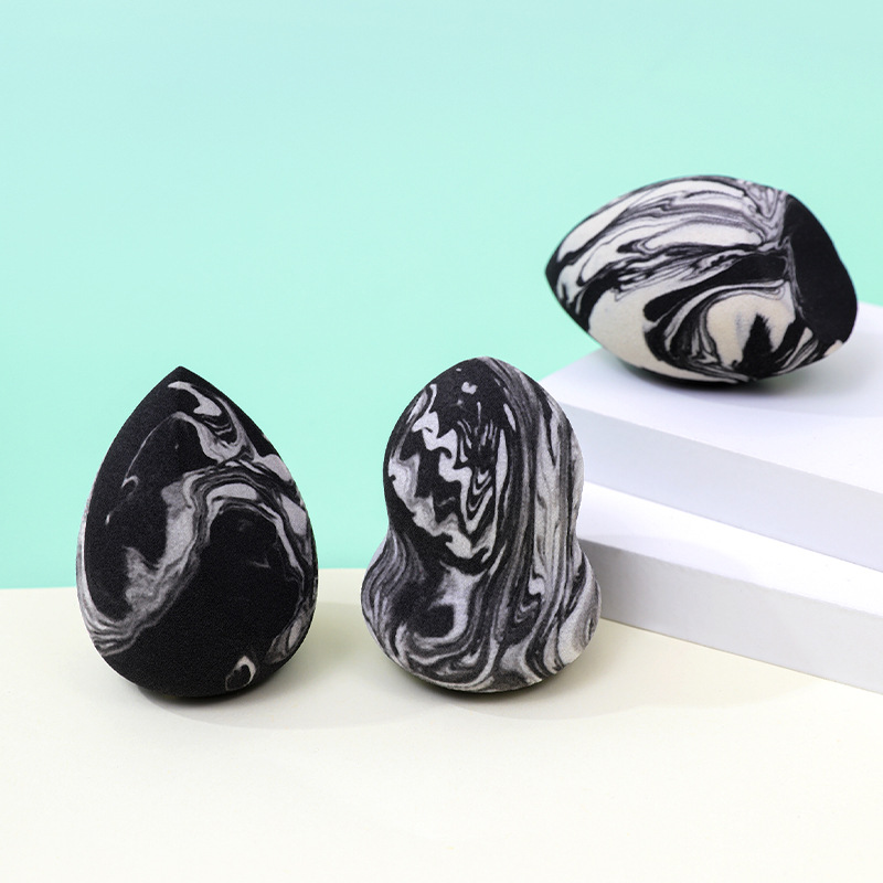 Personalizado de fábrica, mezcla de colores transfronterizos, maquillaje en forma de gota, soplo de polvo de huevo, no coma polvo, se agranda con el agua, esponja de maquillaje sin látex