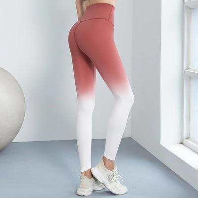 2022 Otoño Nuevo color degradado nude cintura alta pantalones de fitness Peach Hip lifting stretch yoga Pantalones deportivos