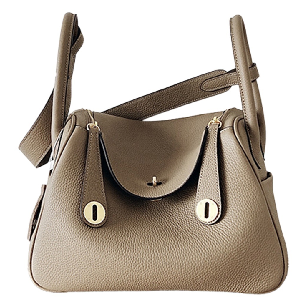 Bolsos de cuero Lindy de piel de vaca con togo de primera capa 2025 Bolsos de cubo retro de estilo europeo y americano Bolsos portátiles de moda