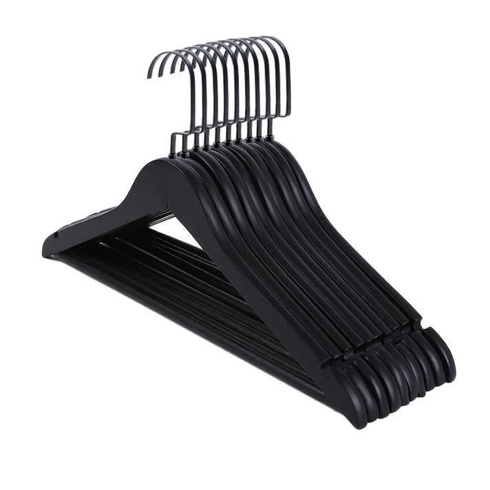 Perchas de madera maciza negra Tienda de ropa Perchas de secado antideslizantes Colgantes de madera de hotel Colgantes de madera natural Colgantes de ropa al por mayor