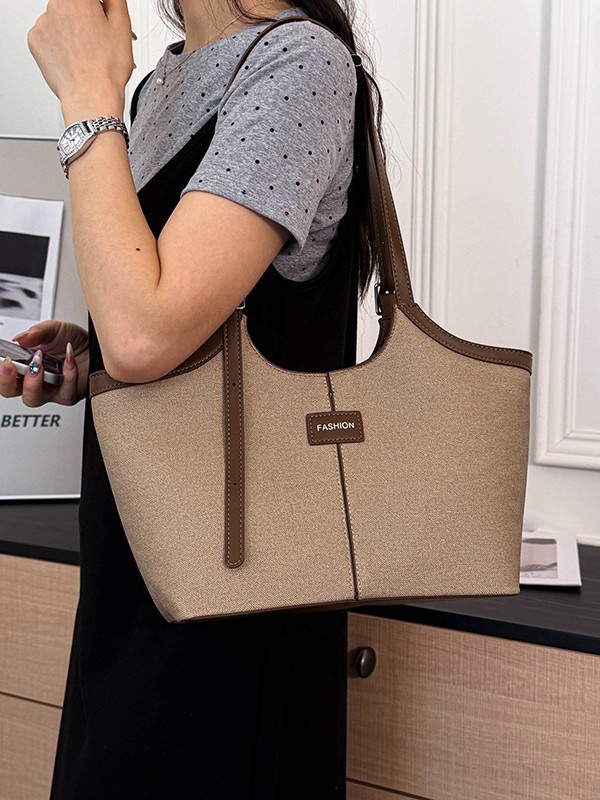 Bolsa de mano retrógrada de nicho para mujeres 2026 comercio exterior nuevo color de choque de alta calidad bolso de hombro de gran capacidad