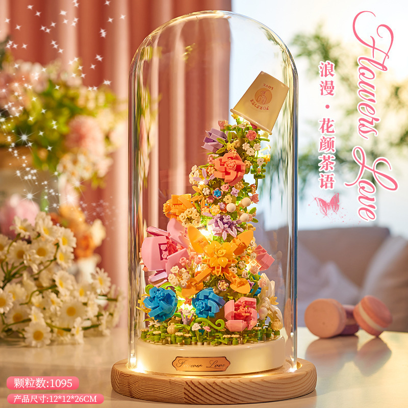 積み木の花がバラのオルゴールを飾っています。|undefined