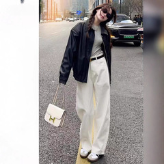 白いストレートジーンズの女性とベルベットの秋冬の大きいサイズの太ったmmの高腰はやせて股の梨の形のスタイルのワイドパンツを隠している