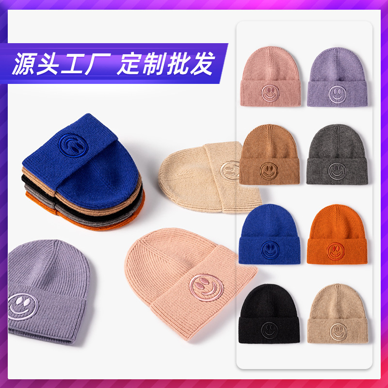 Hombres y mujeres del mismo estilo coreano sombrero de invierno y otoño moda versátil sombrero de punto sonriente sombrero de lana caliente fábrica personalizada