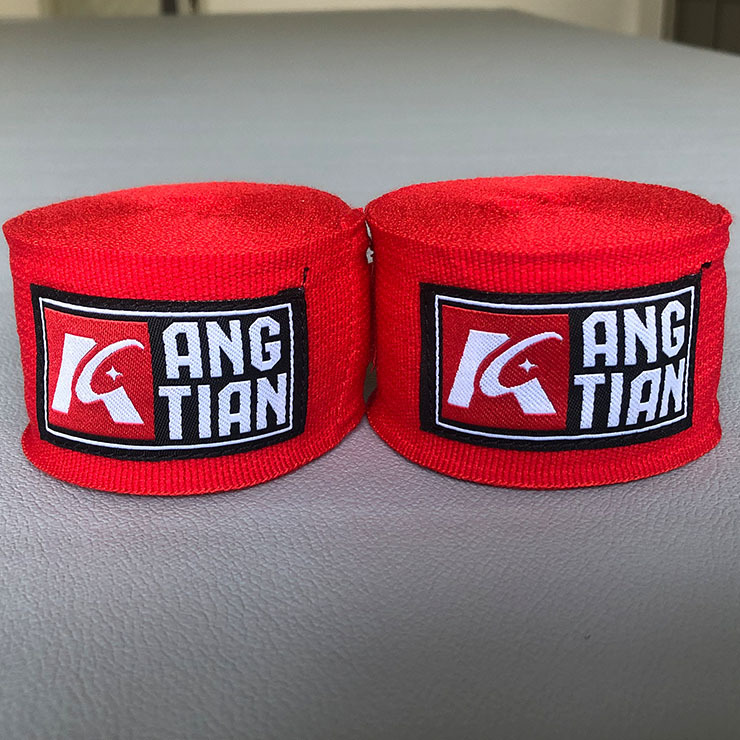 Fábrica Angtian venta directa de vendaje de boxeo guantes de brazo envueltos de mano correa de ataduras taekwondo Sanda protector de mano tela de lucha