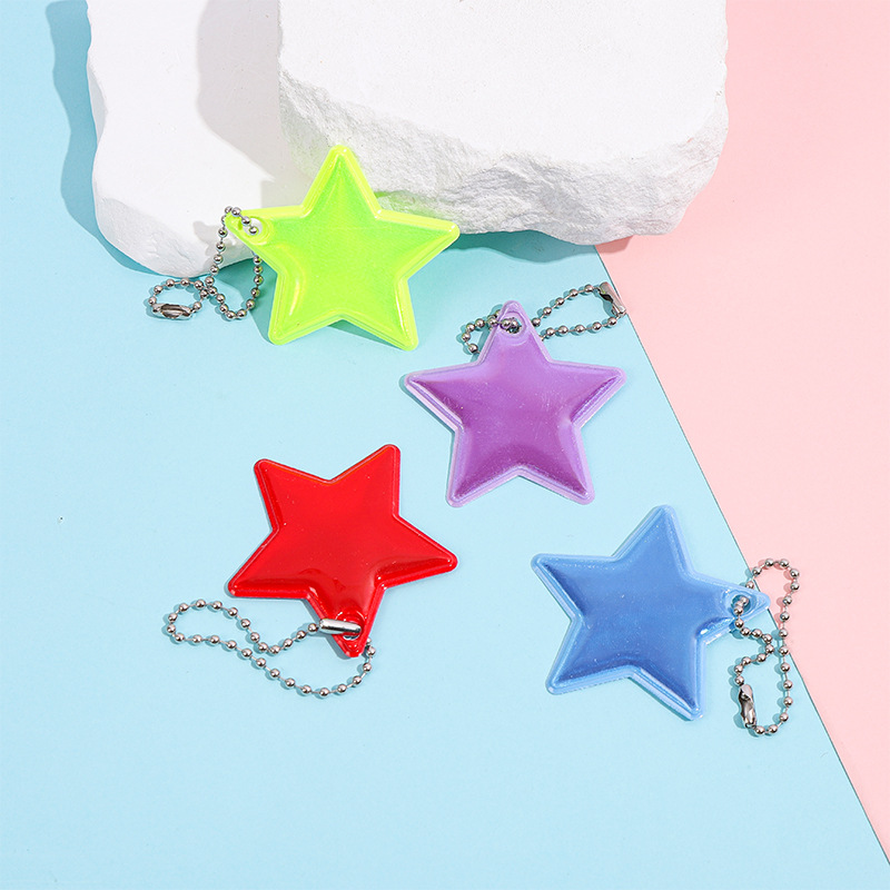 Llavero Colgante Reflectante de Estrella de PVC para Mochila Escolar y Ciclismo