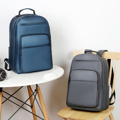 スポット卸売撥水レザーフィルムビジネスバックパック大容量耐衝撃ラップトップバッグバックパックメンズモデル