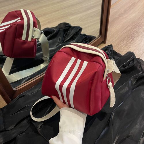 Fashionable and casual new nylon women's bag hand-held cross-body travel bag shell bag versatile sports style pillow bag