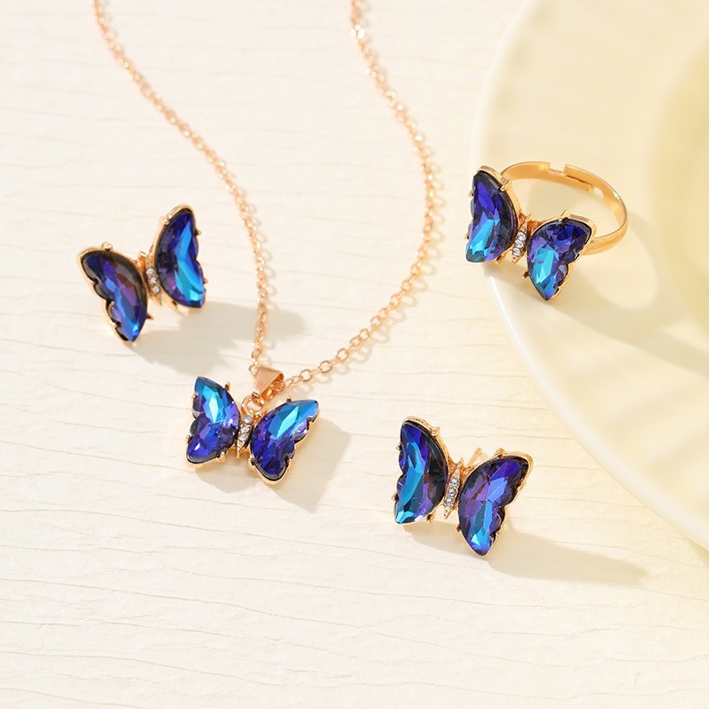 Ventas transfronterizas calientes coloridas 3 piezas de aretes collar anillo de moda europea y americana mariposa elegante collar de diamantes para mujeres