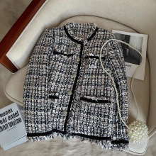 �¹���90��Ѽ�������ڵ��ع�ʱ�дֻ���������ɫ��֯С���A72029