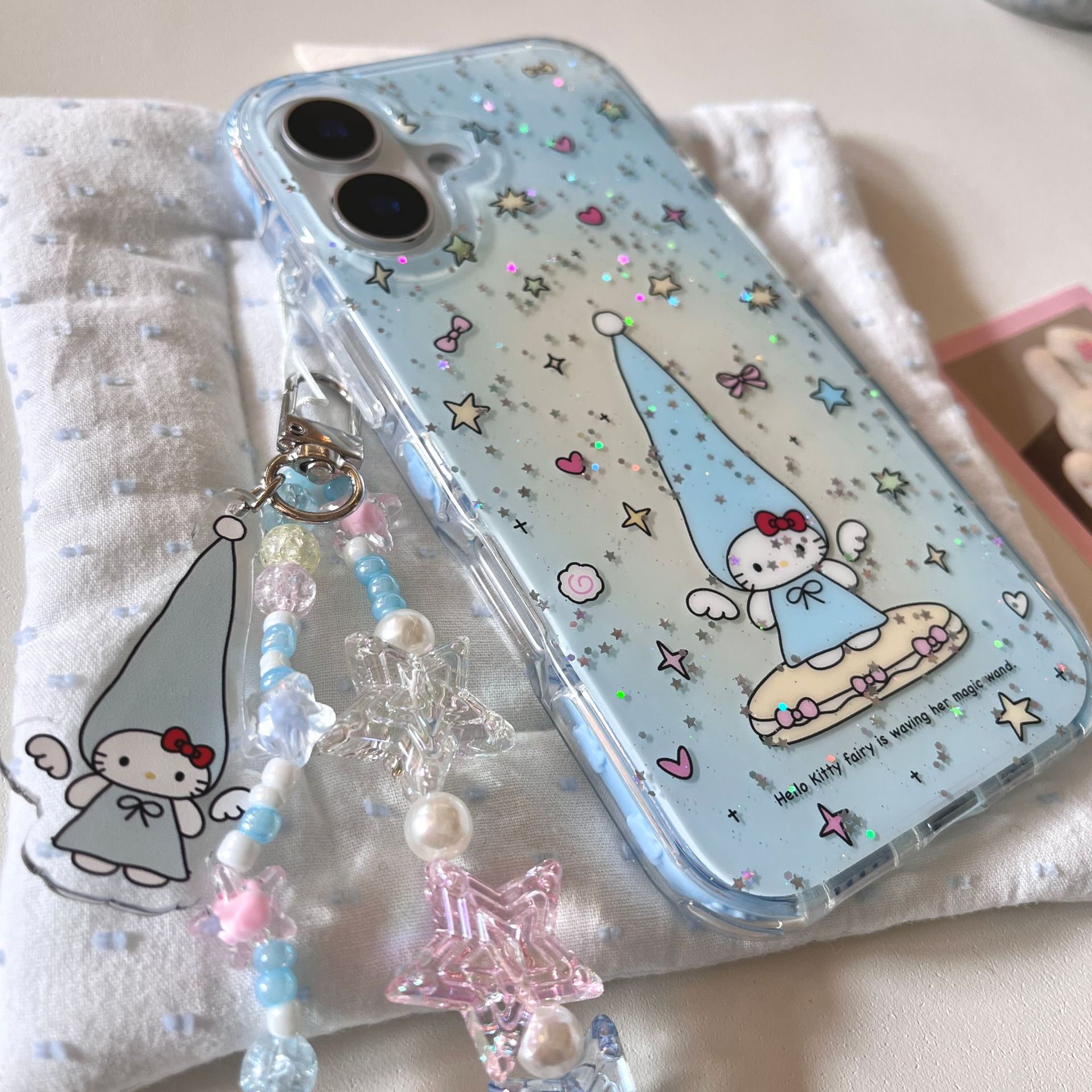 Nicho azul pequeña estrella fresca KT gato para Apple 15/16 funda para teléfono móvil cadena 14Pro 16PM nueva 13 mujer