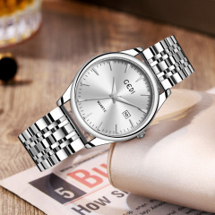 歌迪情侶款經典鋼帶表簡約高級感日曆防水石英表新款高顏值手錶