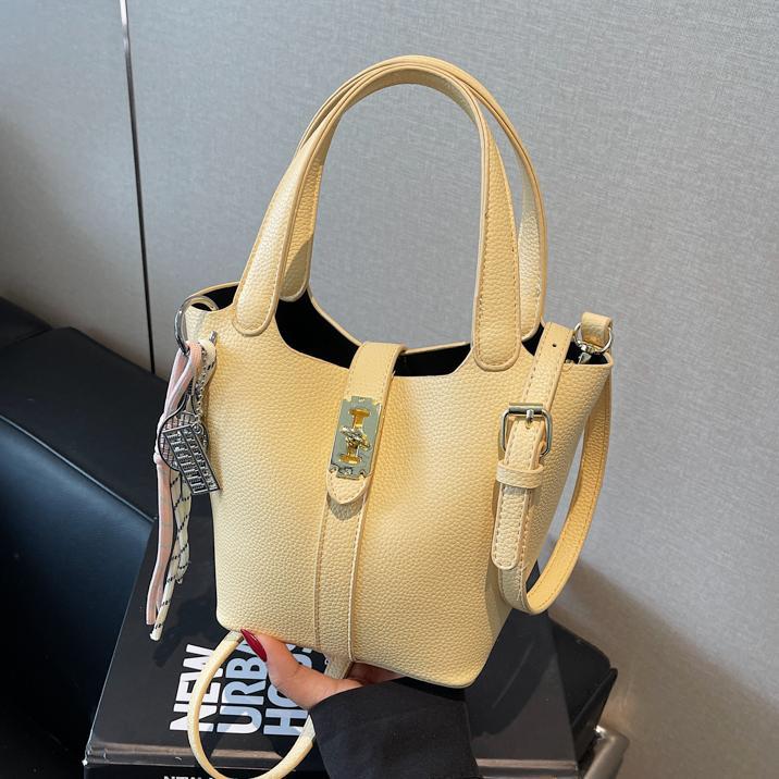 Este año, la popularidad de la bolsa de cubo para mujeres de alta calidad, el nuevo tipo 2025 de moda universal, bolso de transporte, bolso de moda extranjero