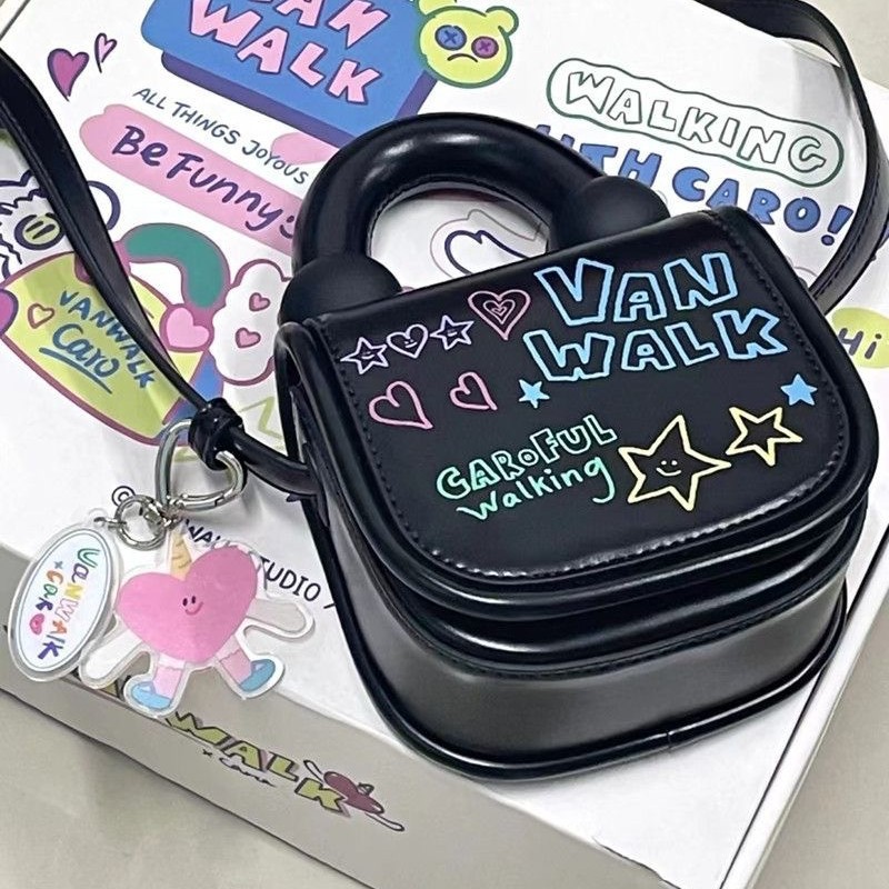 2023 primavera y verano nuevo estilo coreano estudiante bolsa de mensajero bolsa de moda Mini lindo estilo occidental de dibujos animados bolsa de graffiti para mujeres