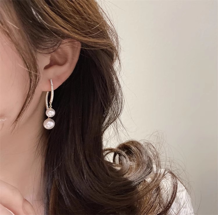 Pendientes largos con flecos elegantes y diamantes con aguja de plata Pendientes de todo fósforo de temperamento de nicho Pendientes simples y ligeros de lujo de alta gama Mujeres