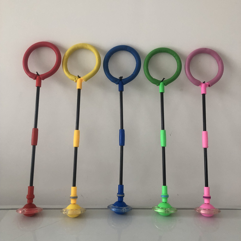 Pie yo-yo slip-on intermitente de los niños hembra salto bola sola rotación rebote plegable anillo de oscilación luminoso