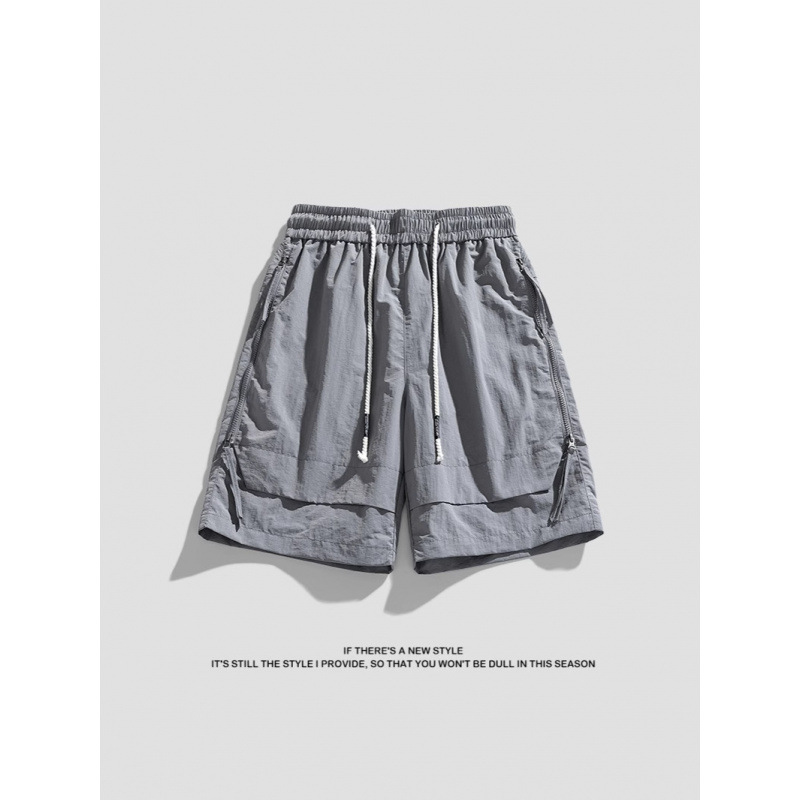 2025 moda hombre todo-fósforo verano delgado multibolsillos elástico casual suelto de secado rápido pantalones de cinco puntos