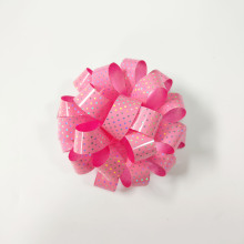 批发新款4英寸星星花跨境自粘花包装礼品花塑料彩带花手拉花