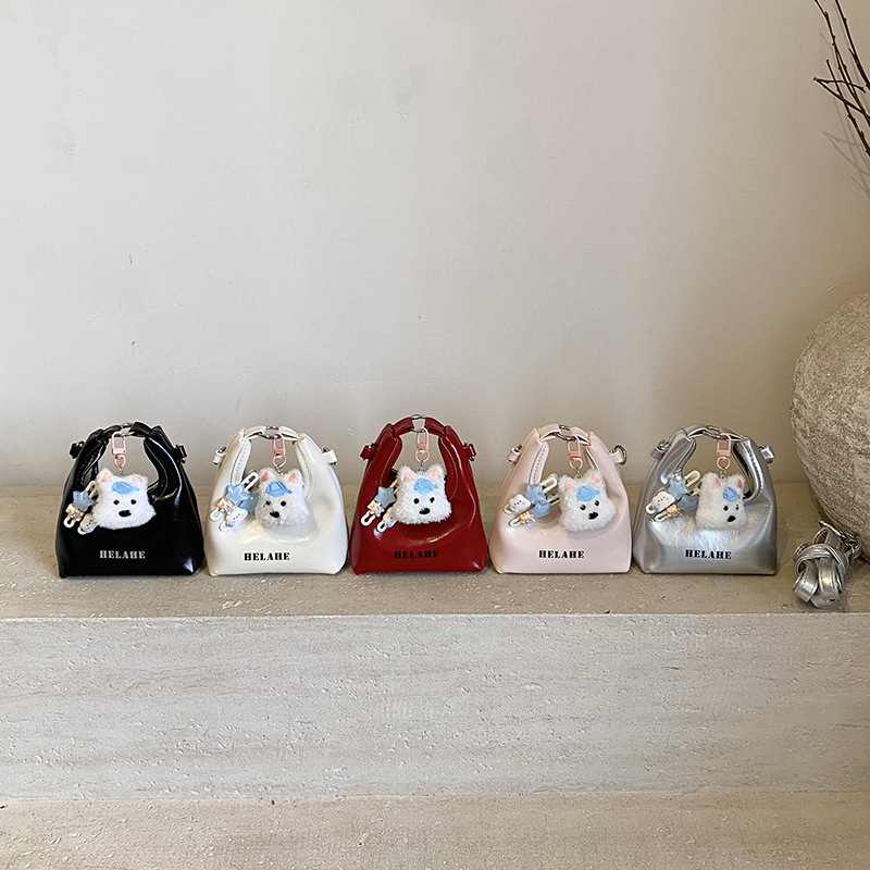 Bagos para niños otoño y invierno nuevo retro mini bolso de mano de piel de aceite lindo perro bolso de media luna auriculares lápiz labial bolso de mochila