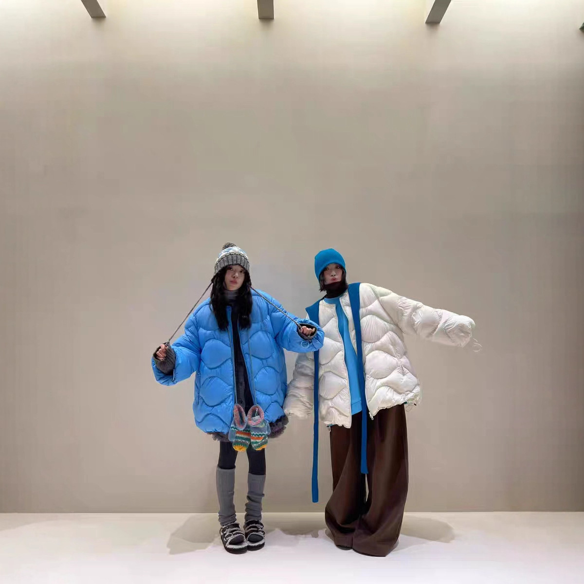 山茶花2025冬季韩版今年流行90白鸭绒压格羽绒服女中长款加厚外套