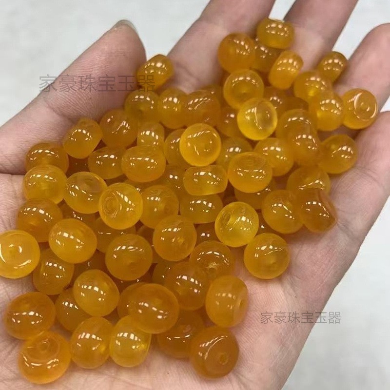 氷の底に青い花が漂っています。10mmのそろばんのビーズは卸売りします。|undefined