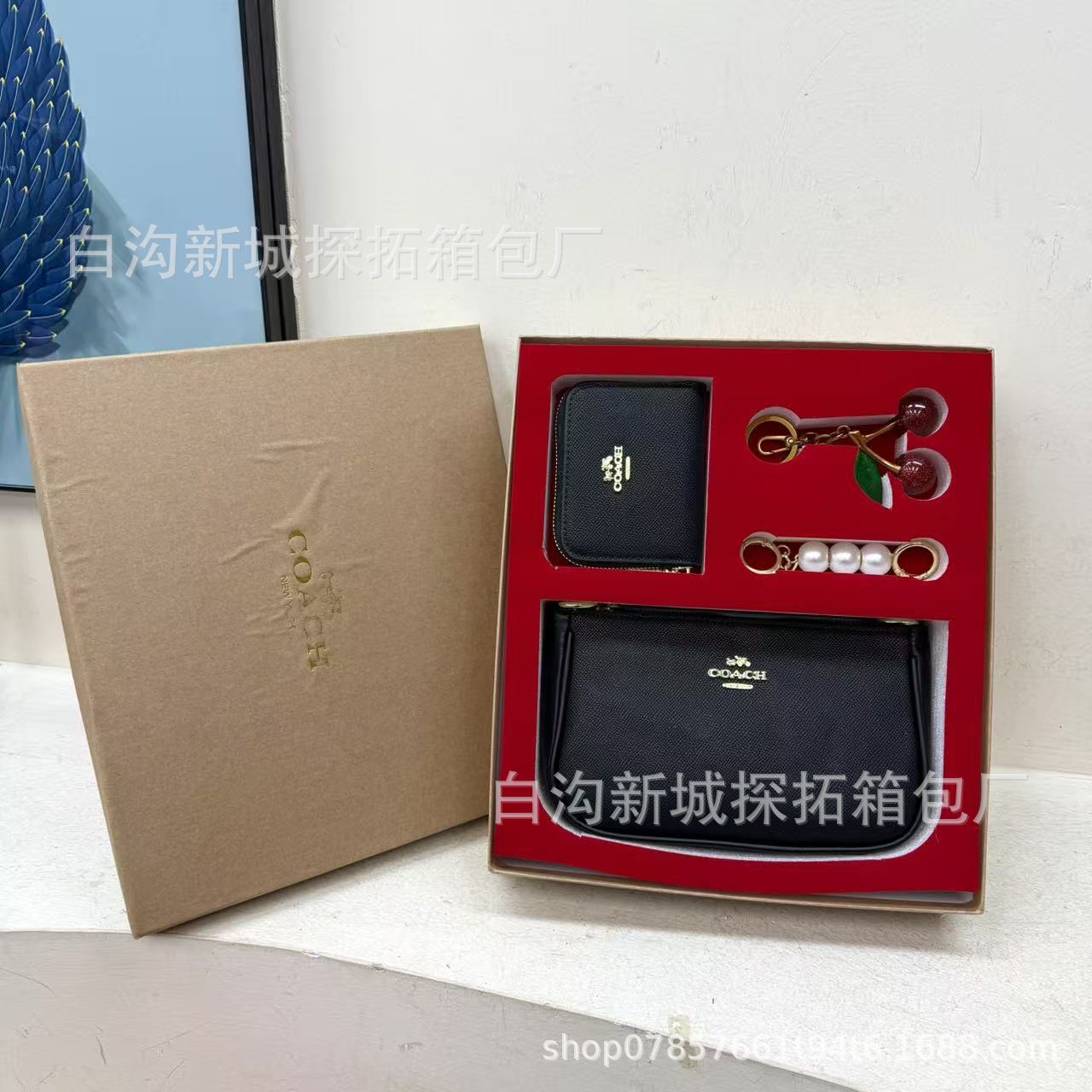 Transfronterizo paquete de bolsas de mano de damas 2025 nueva moda impresa bolsa de cambio llaveros caja de regalo universal