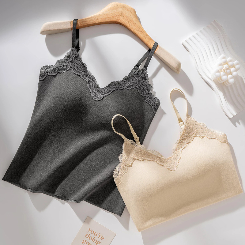 Lace camisole with built-in bra pads, seamless design, adjustable straps, and can be worn as an inner layer or base layer