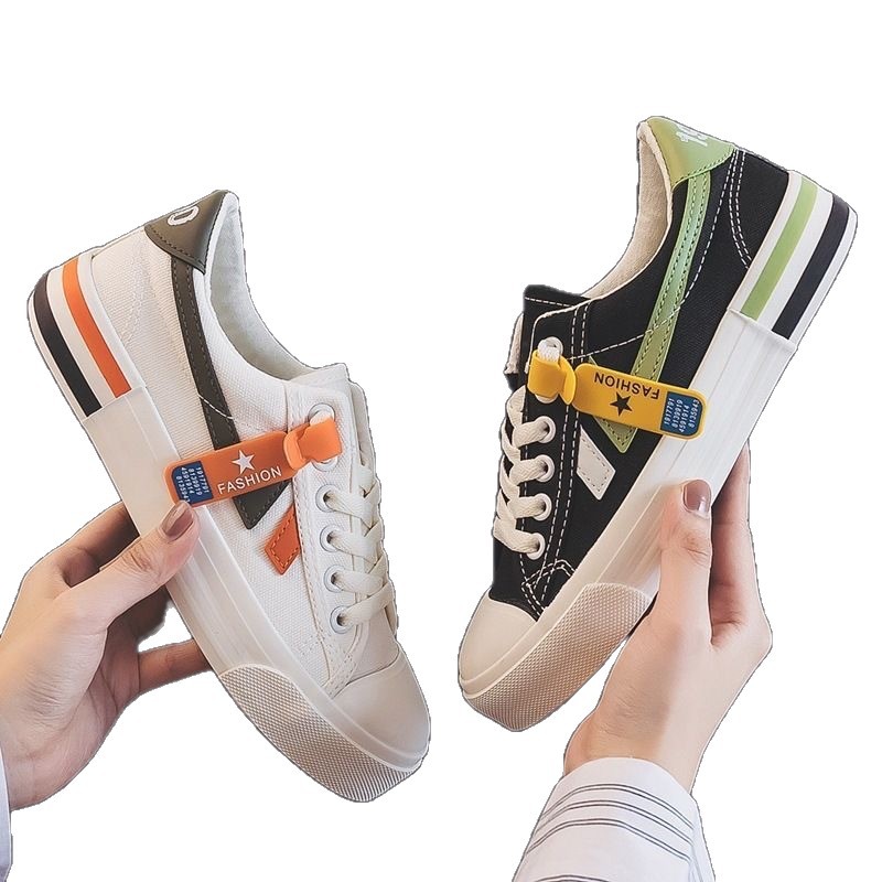 Zapatos blancos de primavera y otoño para mujeres zapatos de lona de altura baja primavera 2026 nuevos estudiantes coreanos zapatos de goma transfronterizos transfronterizos
