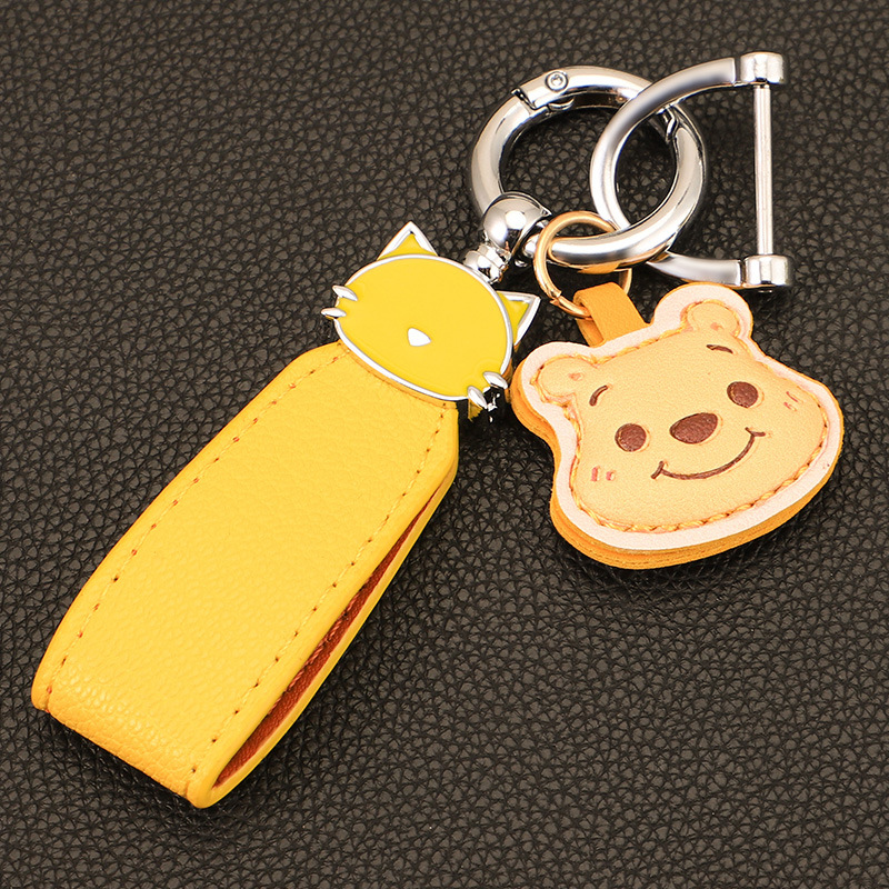 Macaron color gato cuerda de mano llavero de coche colgante de oso de fresa colgante de llavero de oso de cuero de alta calidad colgante de llavero de oso Pooh