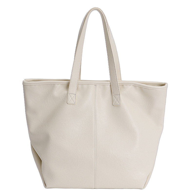 Bolsa de moda retro de gran capacidad para mujeres 2025 nueva simple versátil alta sensación de mochila de viaje diario