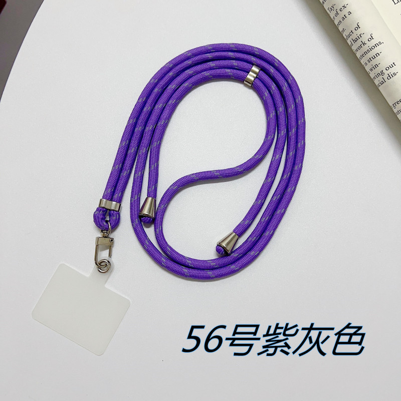 携帯ケースにナイロンのストラップが貼られています。|undefined