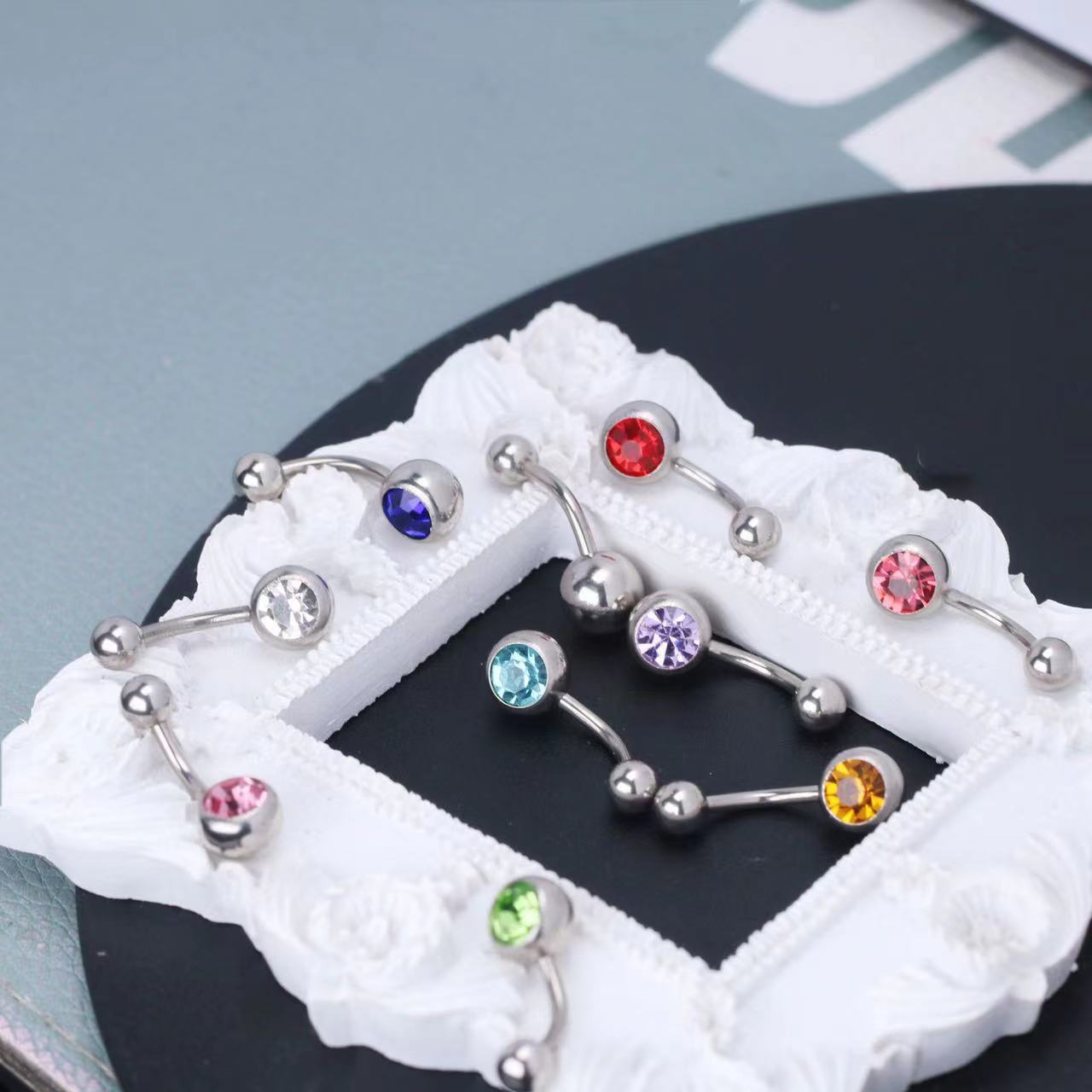 La moda europea y americana de acero inoxidable presión de diamante exquisito solo diamante ombligo anillo nacional rhinestone ombligo uñas básica diamante-incrustado ombligo ornamento