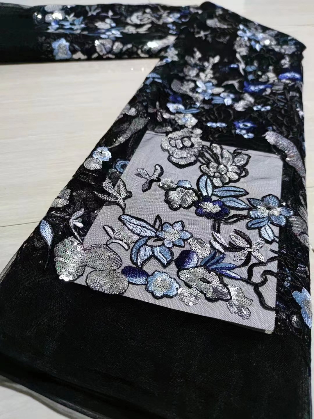 Nueva tela de encaje bordado de malla tridimensional cien flores con cuentas de ratán tela de bordado pesado JX1305