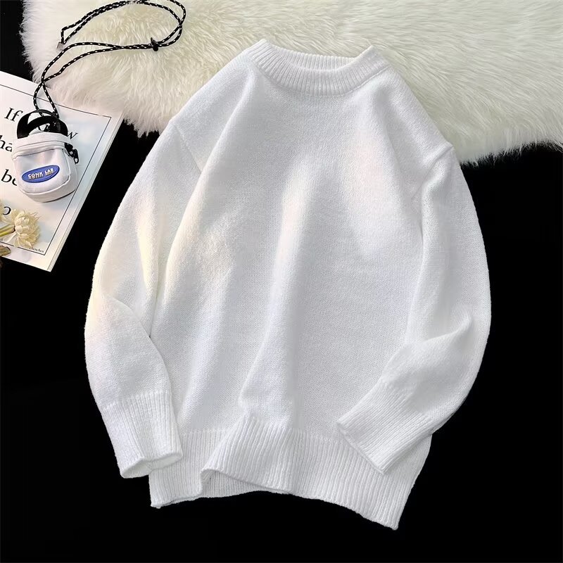 Demi-season solid knitted thin sweater with a round collar