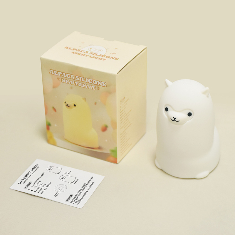 アルパカのシリコンのランプは明かりをたたいてかわいいプレゼントを保護します。|undefined