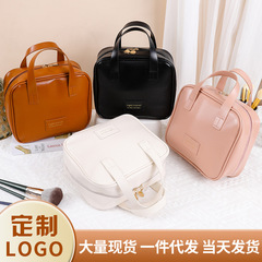 Instagram-worthy leather shell cosmetic bag: High-end, portable lipstick & makeup brush organizer with a large-capacity, water-resistant design.