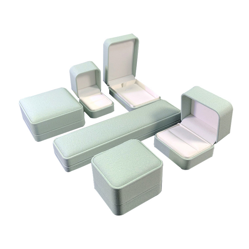 Cubierta de ángulo redondeado fresco caja de joyería de cuero PU caja de embalaje de joyería de moda anillo brazalete embalaje de joyería