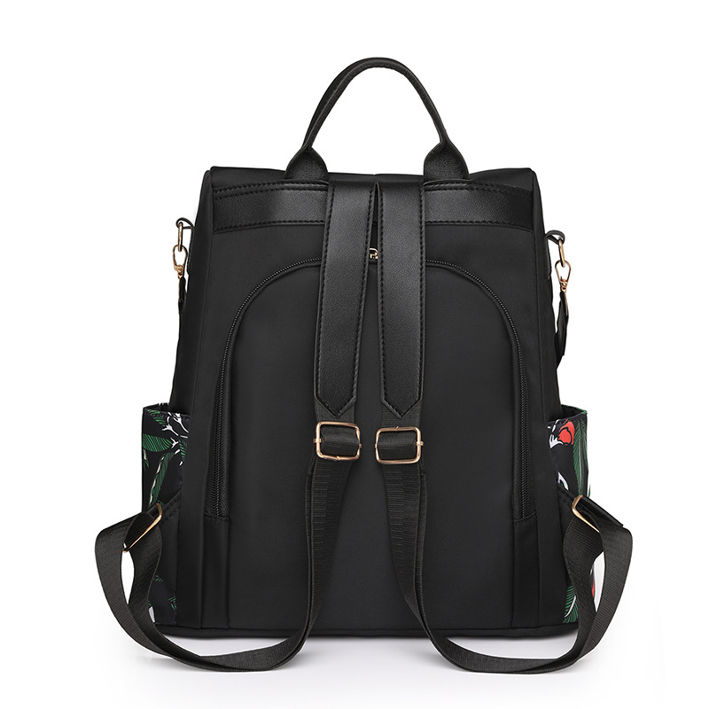 Comercio exterior al por mayor 2023 nueva mochila antirrobo de nailon para mujer casual moda color multifunción mochila de doble uso